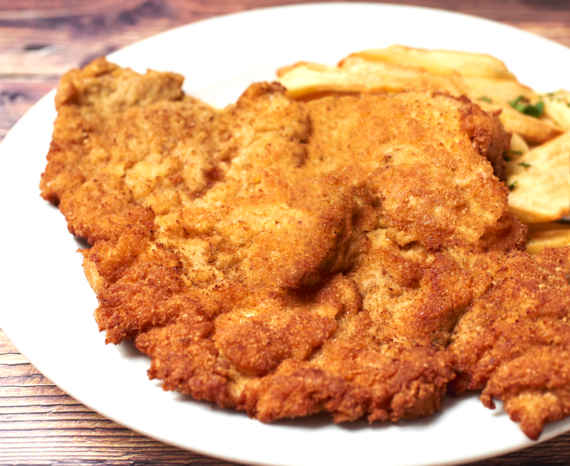 XL Pork chop, potatoes, fried cabbage