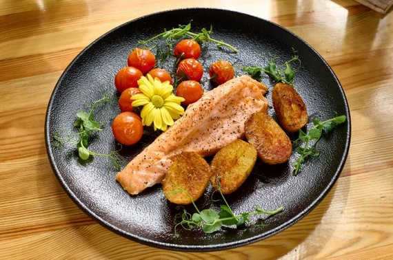 Salmon with fried tomatoes”